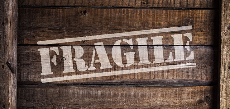 Wooden packaging box crate with fragile text and glass sign